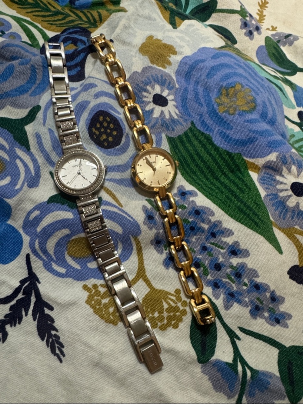 Two Fossil Silver Crystal Accent Watches and one Gold Chain-Link Watch